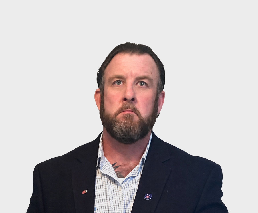 Professional portrait of Anthony Hattar in a blazer